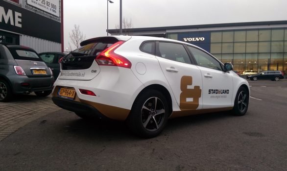 Stad&Land Makelaars autobelettering